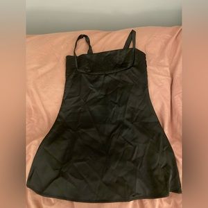 Black mini dress from STHCUTE. Size small never worn tags still on.